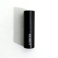 Beirut Eau de Parfum by Essenzia, faceted black bottle with gold label and smoked crystal base