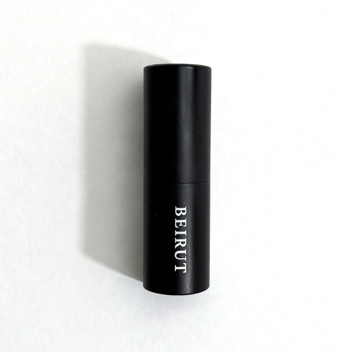 Beirut Eau de Parfum by Essenzia, faceted black bottle with gold label and smoked crystal base