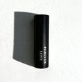 Forever Love Eau de Parfum by Essenzia, faceted black bottle with gold label and red crystal base
